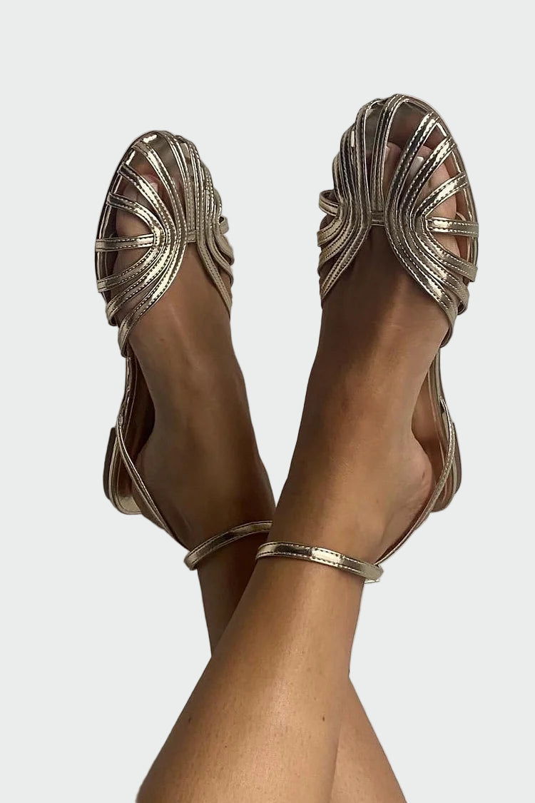 Flat sandals with braided straps