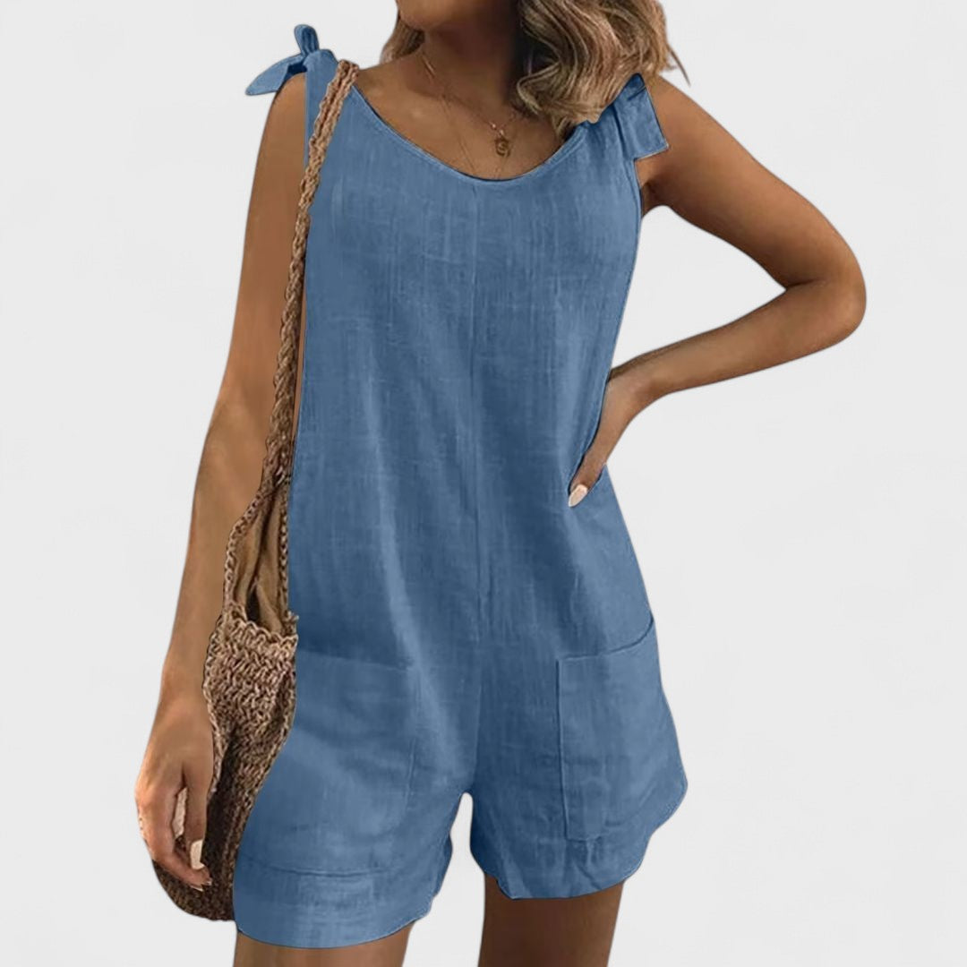 Short jumpsuit with shoulder pockets and ties